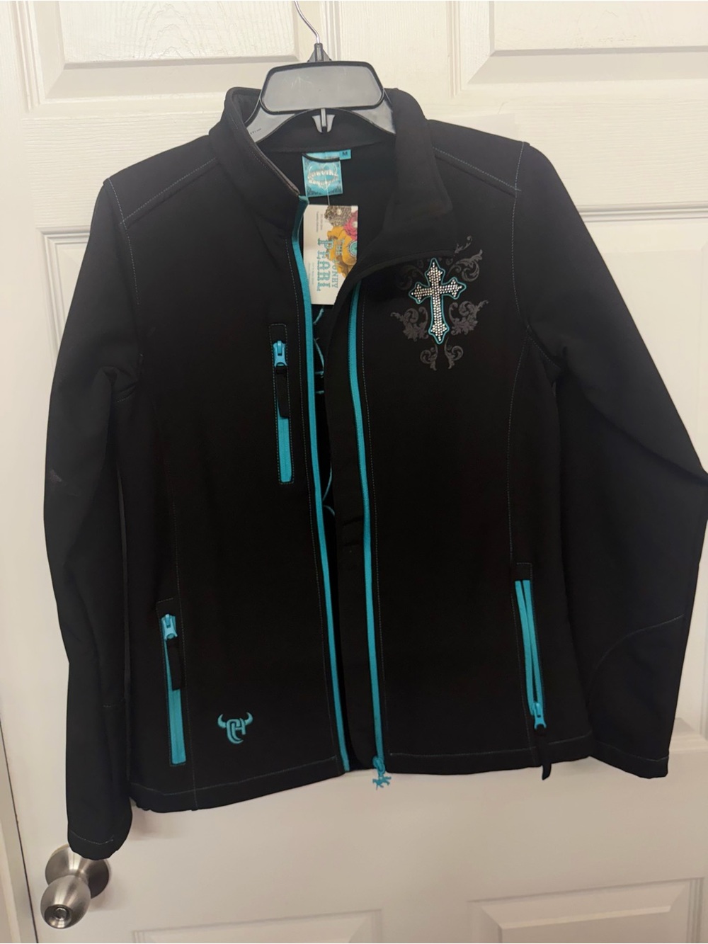 Black Utility Jacket with Teal Trim and Embroidered Cross